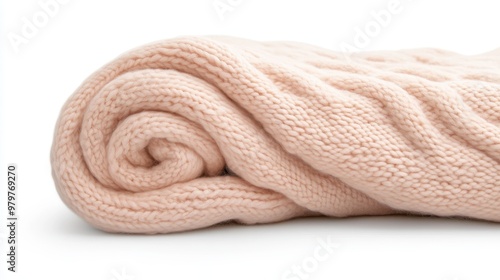 A knitted blanket is shown in a white background