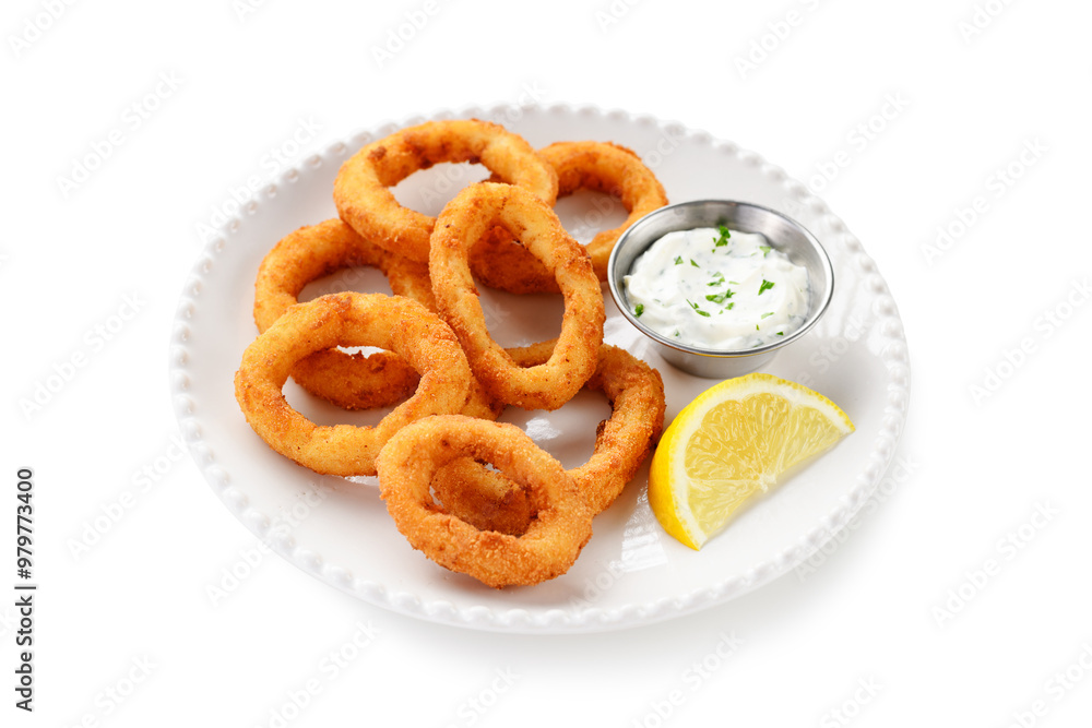 Delicious crispy fried calamari rings with white sauce and lemon slice. isolated on white background Delicious crispy fried calamari rings with white sauce and lemon slice. isolated on white background