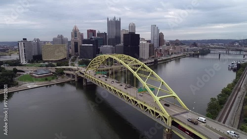 Fort Pitt Bridge in Pittsburgh, Pennsylvania. Traffic in Foreground, Cityscape with Skyscrapers in Background. photo