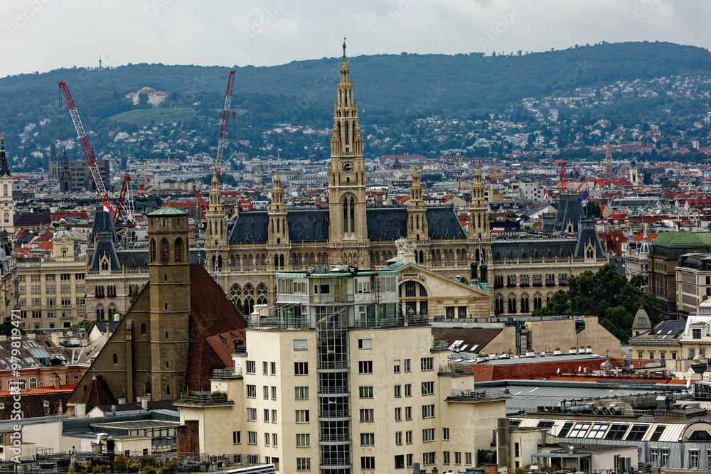 Obraz premium Time Lapse from the central tower with a view of the city of Vienna in Austria. The unique and colorful skyline combines the ancient classical and gothic with the contemporary with skyscrapers. 