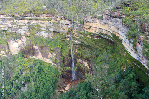 Photograph of a scenic waterfall cascading in the Grose Valley near Blackheath in the Blue Mountains in New South Wales, Australia. photo