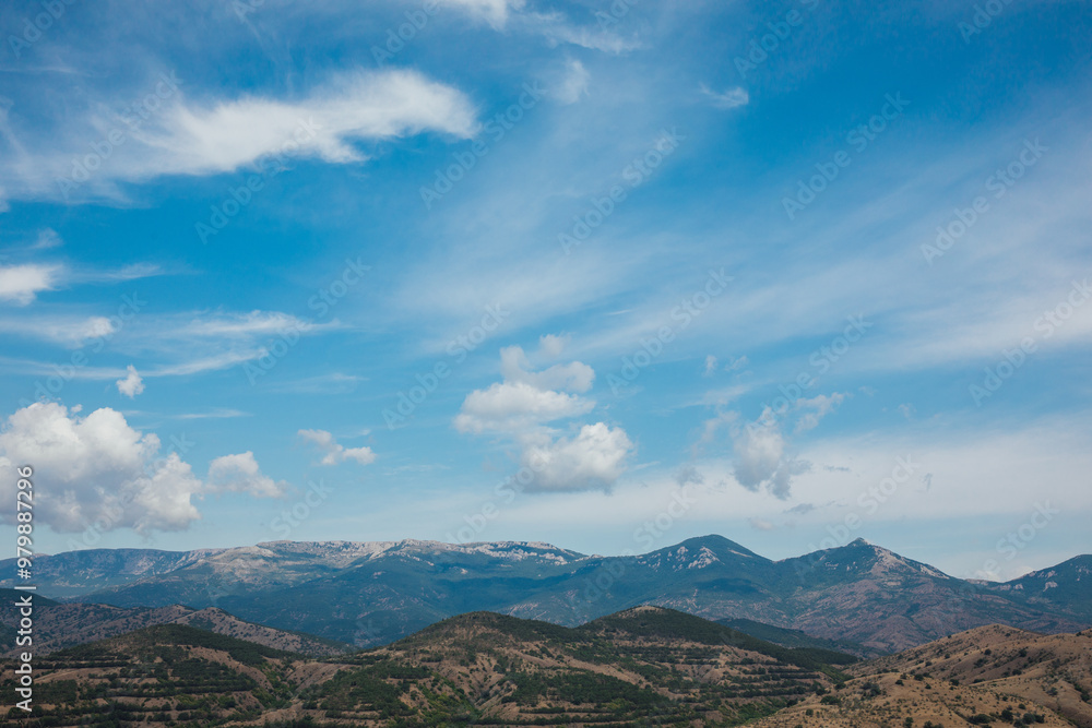 Beautiful scenery, mountain range and blue sky with clouds Beautiful scenery, mountain range and blue sky with clouds
