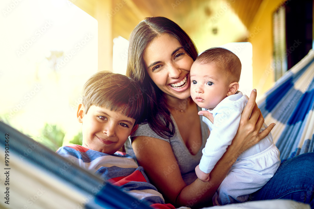Fototapeta premium Portrait, woman and children in hammock for playing, together and bonding in family home on weekend. Female person, kids and happiness for relax, comfort and joy with care, love and support in France