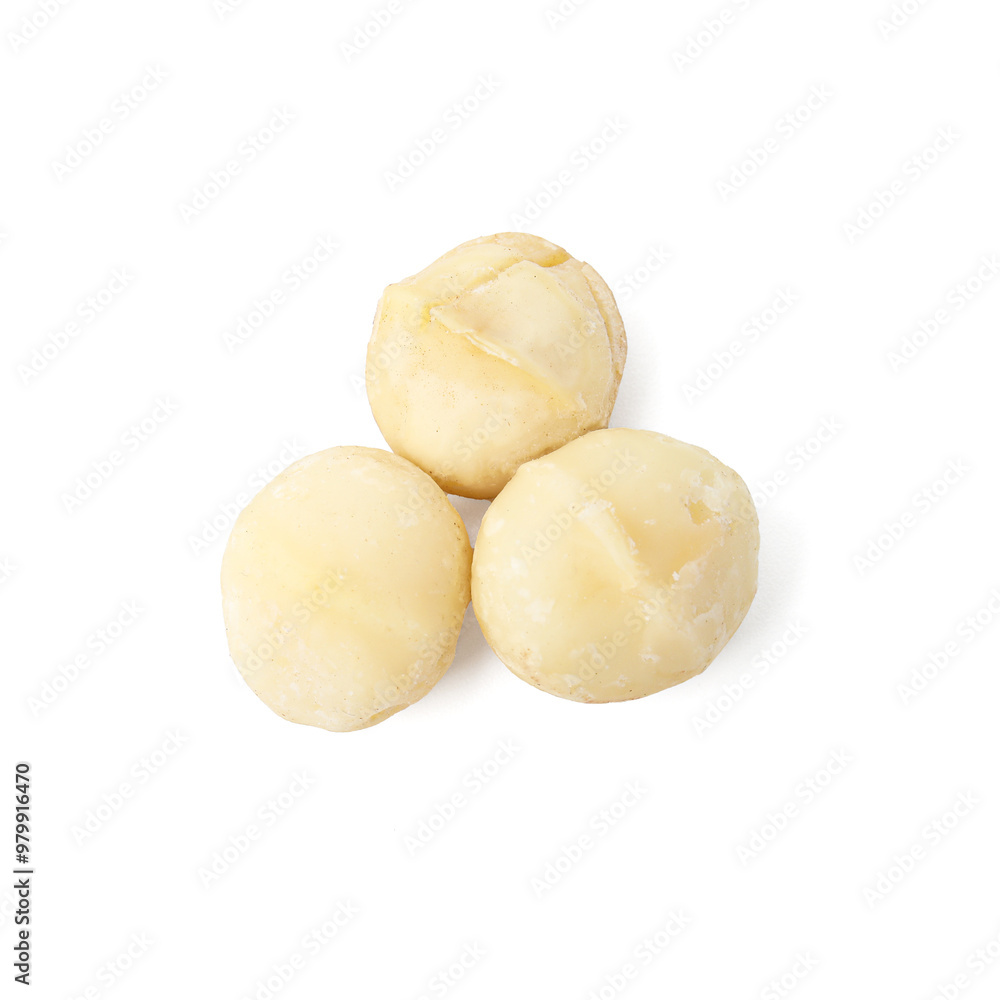 Whole peeled macadamia nuts isolated on white, top view Whole peeled macadamia nuts isolated on white, top view