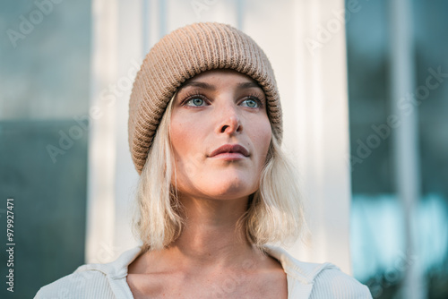 portraits of nice looking blonde girl with hat in scandinavia