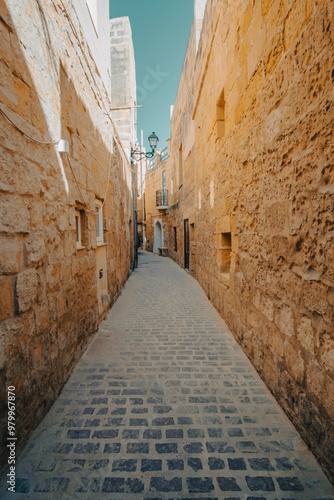 Beautiful old tight streets with cobble stones in the old town of Gozo, Malta