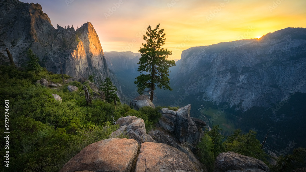 hiking the four mile trail at sunset in yosemite national park, california