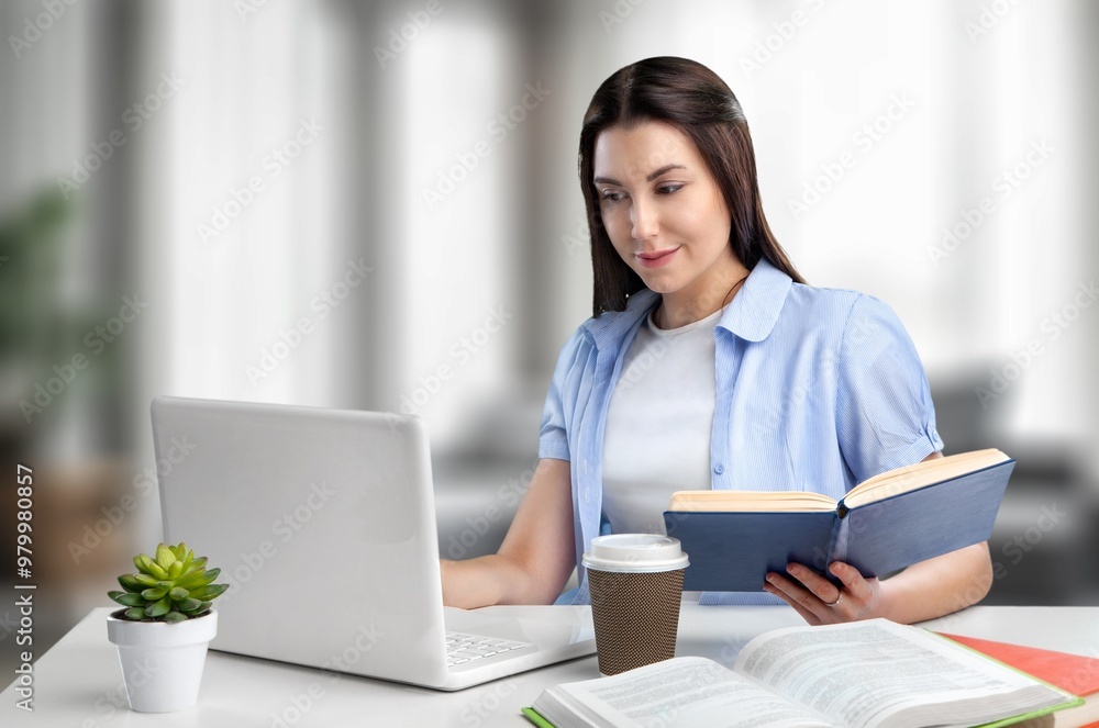 Happy business woman writing in laptop online education. Happy business woman writing in laptop online education.