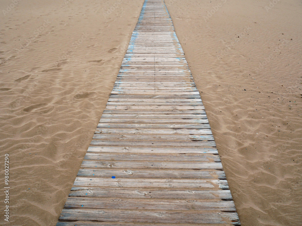 Wood footpath on the beach Wood footpath on the beach