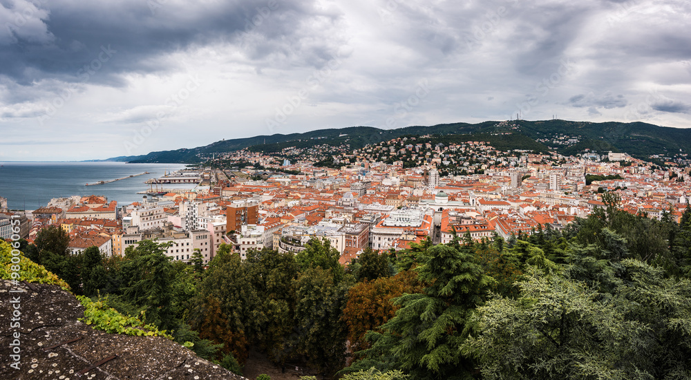 Fototapeta premium Cityscape overview aerial panorama of Trieste a city and seaport in northeastern Italy in region of Friuli-Venezia Giulia.