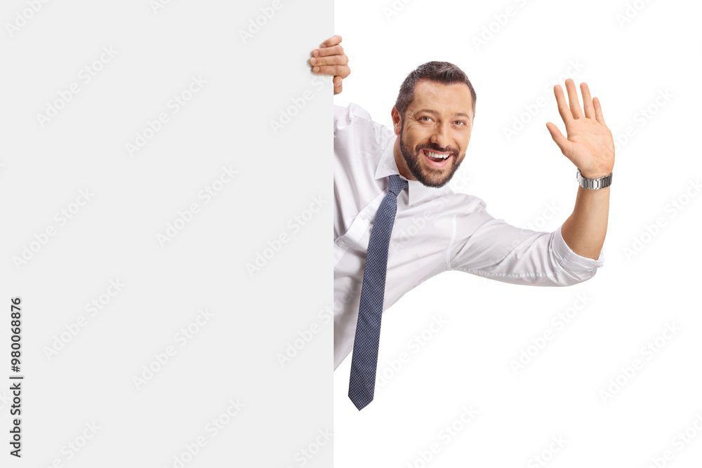 © Ljupco Smokovski - Cheerful man waving behind a blank white panel