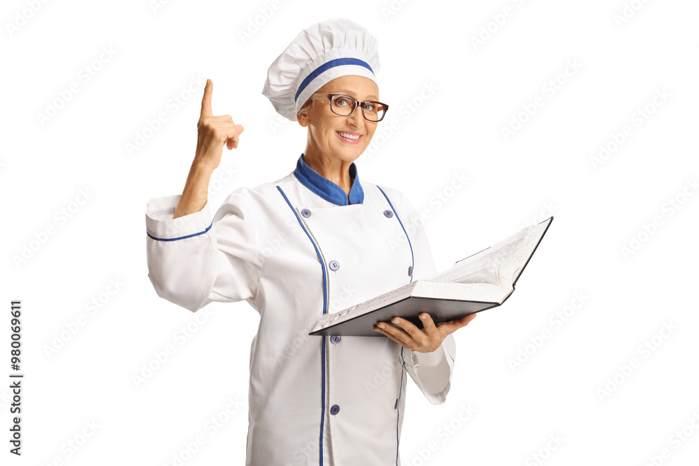 Female chef holding a cook book and pointing up Female chef holding a cook book and pointing up