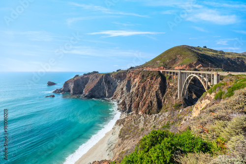 Beautiful scenery of Pacific Ocean coast along Highway 1 and Big Sur, wonderful aerial view of Bixby Bridge, sunset, sunrise, fog. Concept, travel, vacation, weekend