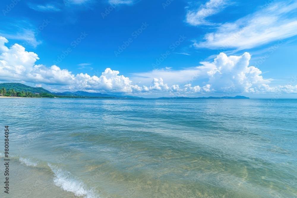 Stunning summer tropical beach scene in Chonburi Thailand with clear skies and calm ocean waves Stunning summer tropical beach scene in Chonburi Thailand with clear skies and calm ocean waves