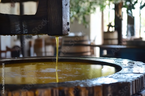The millstone extracts olive oil from olives