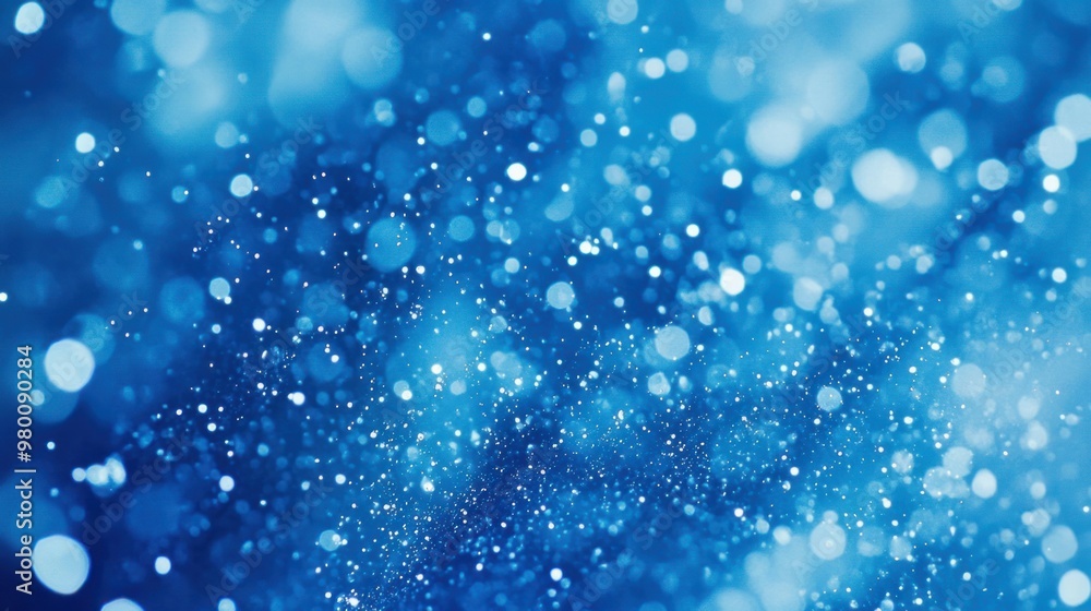 A bright electric blue background with small, scattered speckles of light. Energetic and modern. A bright electric blue background with small, scattered speckles of light. Energetic and modern.