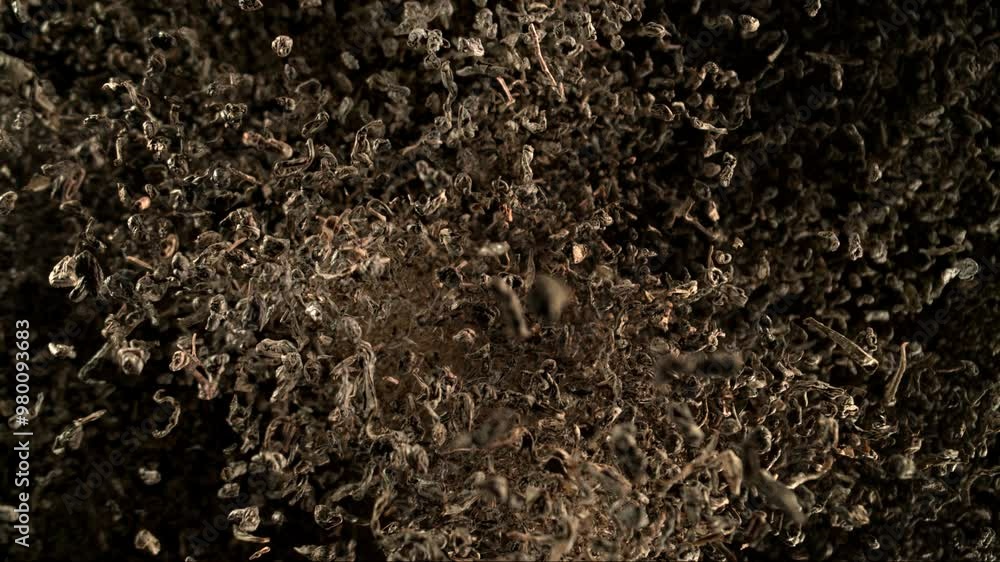 Super Slow Motion Shot of Dried Tea Flying Towards Camera at 1000fps. Super Slow Motion Shot of Dried Tea Flying Towards Camera at 1000fps.