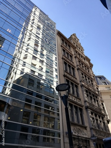 Wallpaper Mural The old one, the new one and the reflected one, a skyscraper triangle Torontodigital.ca