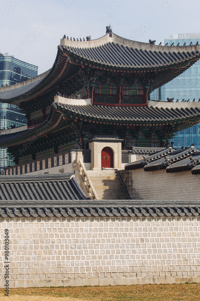 Fototapeta premium Gyeongbokgung Palace, Seoul, Jongno District, South Korea, in a spring sunny day, exterior view of main Korean royal palace with Gwanghwamun Gate, travel to Republic of Korea