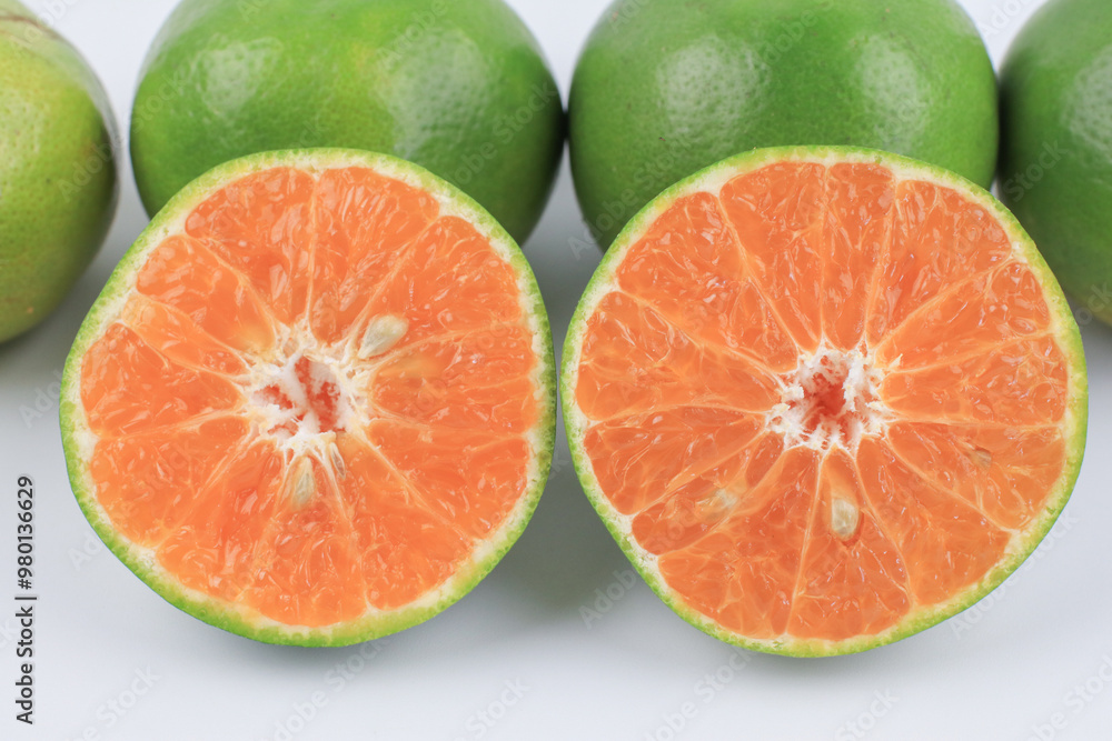 Fresh orange fruit with sliced on white background. Fresh summer fruit high vitamin C. Refresh drink. Fresh orange fruit with sliced on white background. Fresh summer fruit high vitamin C. Refresh drink.