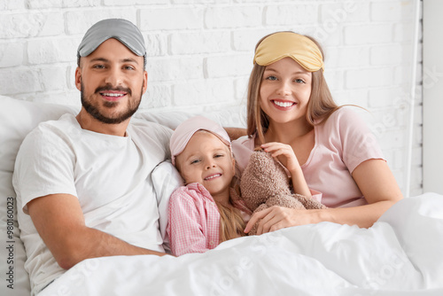 Happy parents and their lit...