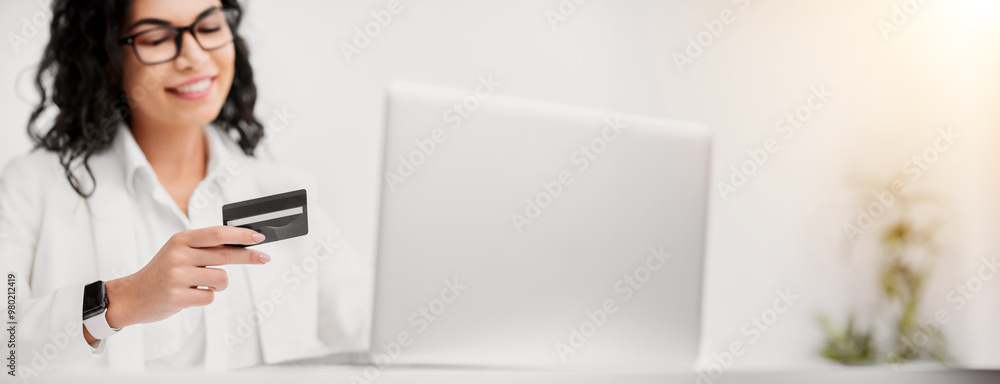 Shopping Online. Happy mexican woman making purchases, selective focus on plastic credit card. Copy space Shopping Online. Happy mexican woman making purchases, selective focus on plastic credit card. Copy space