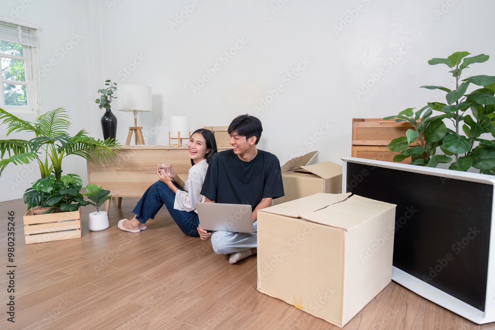 Couple Enjoying Relaxed Moments During Home Move-In Process Couple Enjoying Relaxed Moments During Home Move-In Process