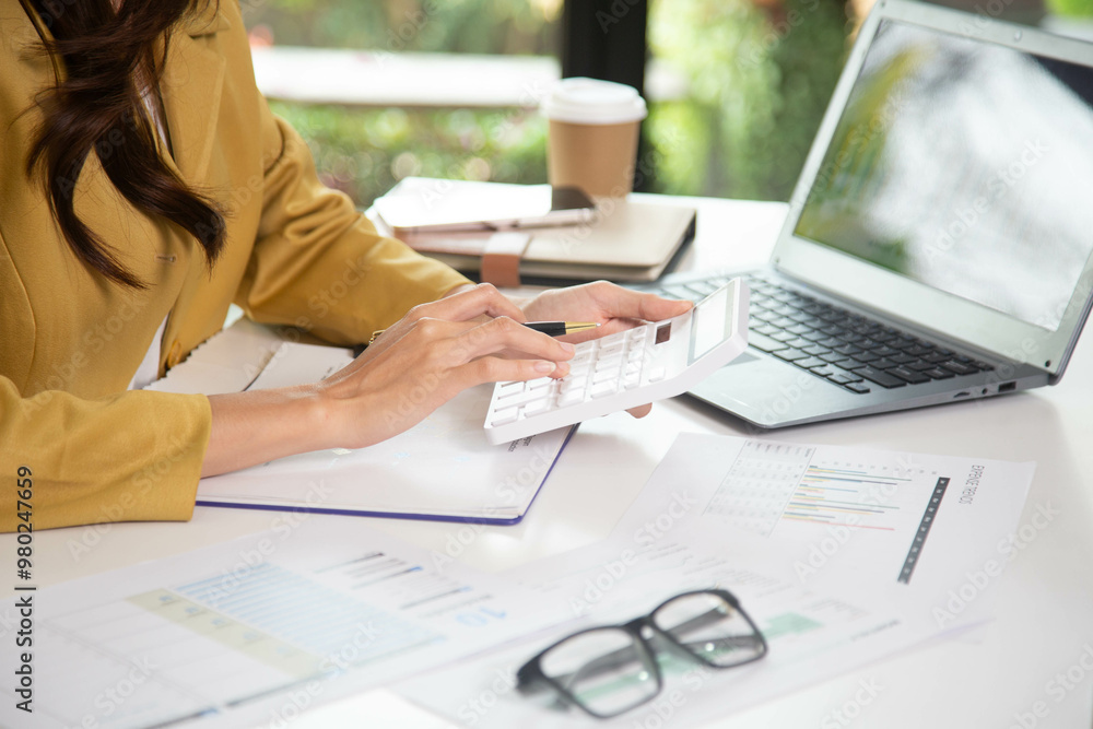 Business finance woman calculating budget numbers, Invoices and financial adviser working. Business finance woman calculating budget numbers, Invoices and financial adviser working.