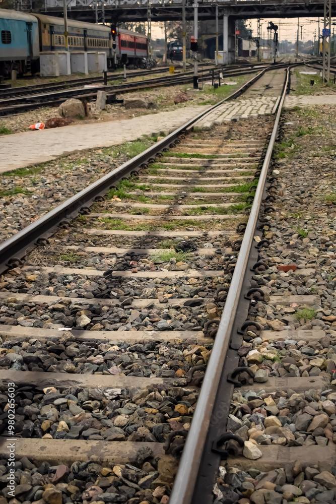 View of train Railway Tracks from the middle during daytime at Amritsar railway station in India, Train railway track view, Indian Railway junction, Heavy industry View of train Railway Tracks from the middle during daytime at Amritsar railway station in India, Train railway track view, Indian Railway junction, Heavy industry