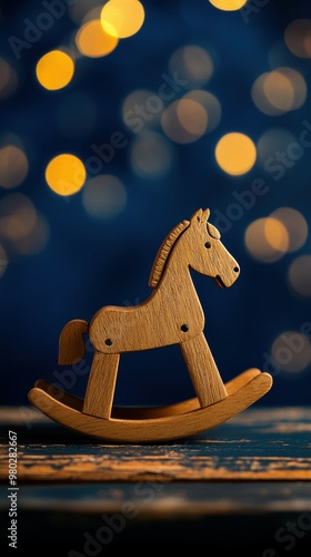 Wooden rocking horse toy placed on a rustic wooden table, with a deep royal blue background and soft holiday bokeh, copy space, Merry Christmas background, festive toy showcase, holiday gift photo