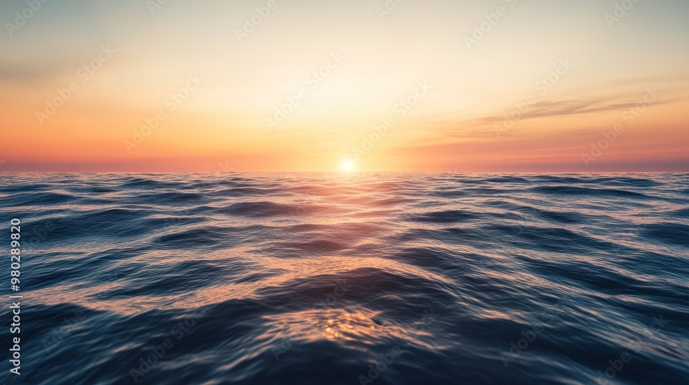 Fototapeta premium The ocean sleeps under the calm embrace of sunset.