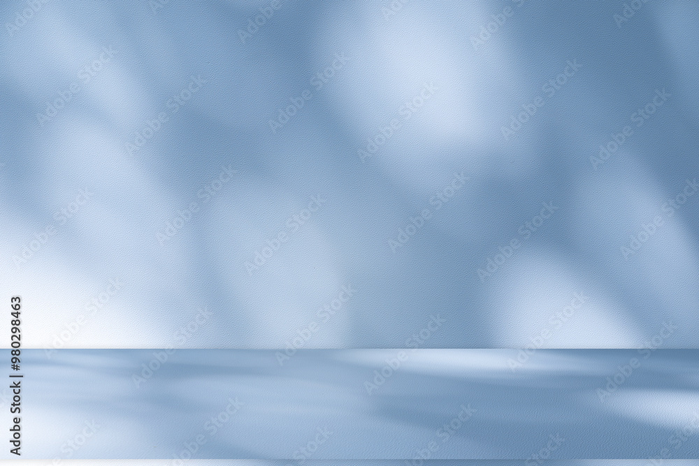 Wall interior background, studio and backdrops show products. with leaf shadow from window color blue and white. background for text insertion and presentation of product Wall interior background, studio and backdrops show products. with leaf shadow from window color blue and white. background for text insertion and presentation of product