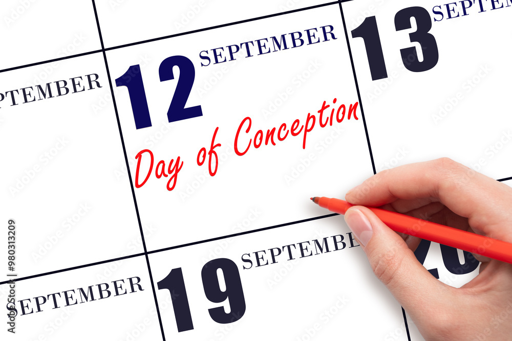 September 12. Hand writing text Day of Conception on calendar date. Save the date. September 12. Hand writing text Day of Conception on calendar date. Save the date.