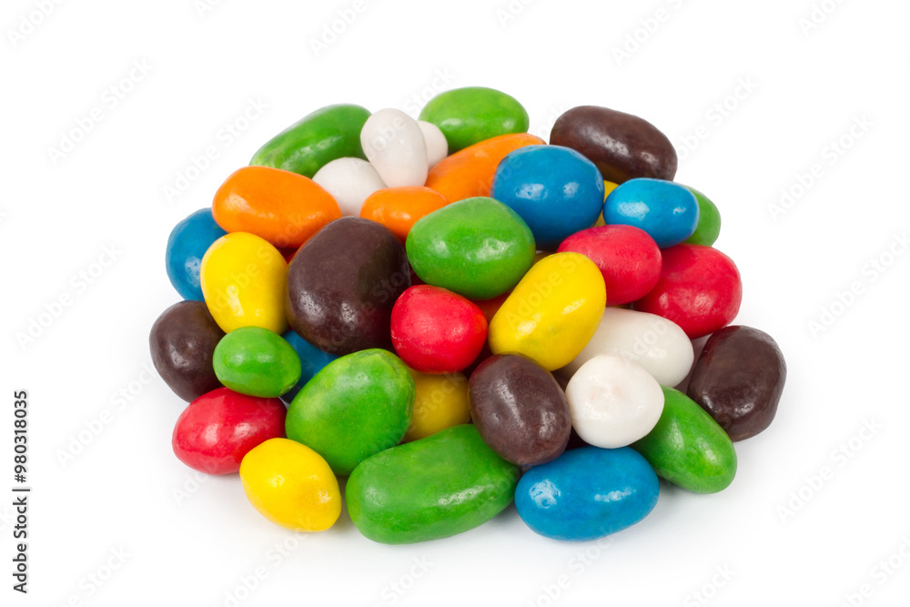 Pile of colorful candies dragee isolated on a white background. Round sweet candies. Pile of colorful candies dragee isolated on a white background. Round sweet candies.