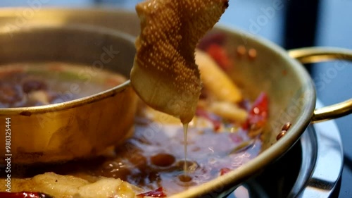 boiling hot pot with omasum chinese cuisine closeup video