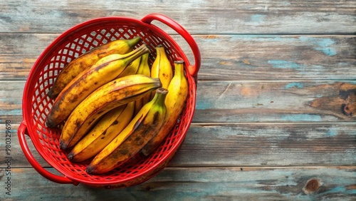 Ripe plantains in a red basket , yellow, ripe, plantains, cluster, bunch, basket, tropical, fruit, food, vibrant, ripe