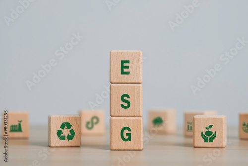 ESG on a woodblock It is an idea for sustainable organizational development. account the environment, society and corporate governance. ESG concept of environmental, social and governance.