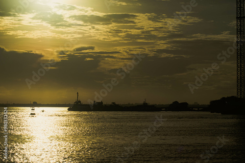 The Mactan Channel in Cebu, Philippines is a busy waterway that connects the Mactan Island and the mainland. It is home to numerous buildings, cargo ships, bridges, serving as a vital hub for trade