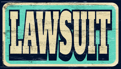 Aged and worn lawsuit sign on wood  