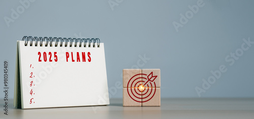 New year plans 2025. Text on Note Pad with calendar, 2025 Budget planning and allocation concept.