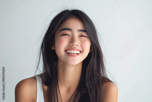 Smiling Woman with Long Black Hair