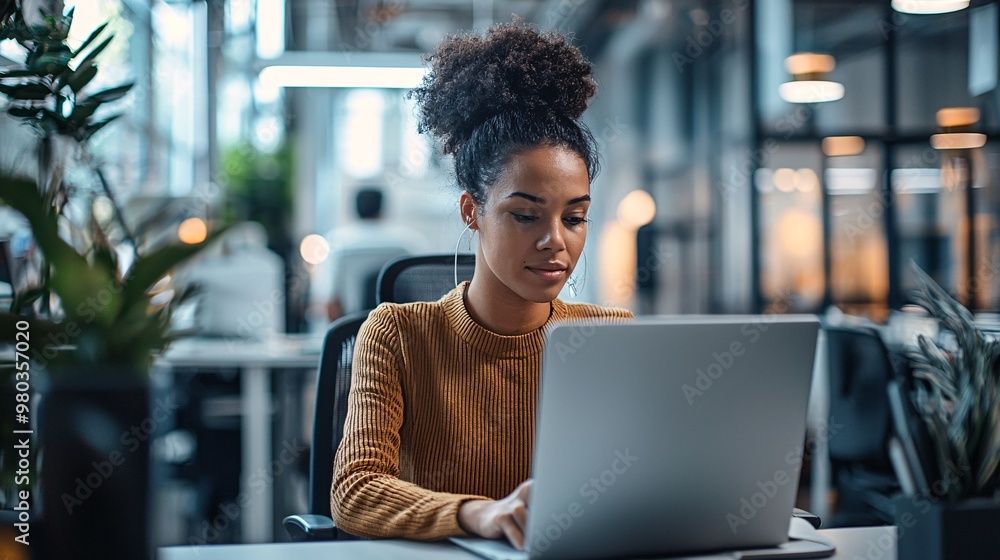A young professional enhances her contemporary workspace with innovative tools to boost efficiency and inspire creativity. A young professional enhances her contemporary workspace with innovative tools to boost efficiency and inspire creativity.