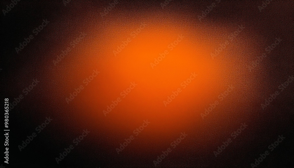 A diffused orange spotlight creates a gradient effect on a dark surface A diffused orange spotlight creates a gradient effect on a dark surface