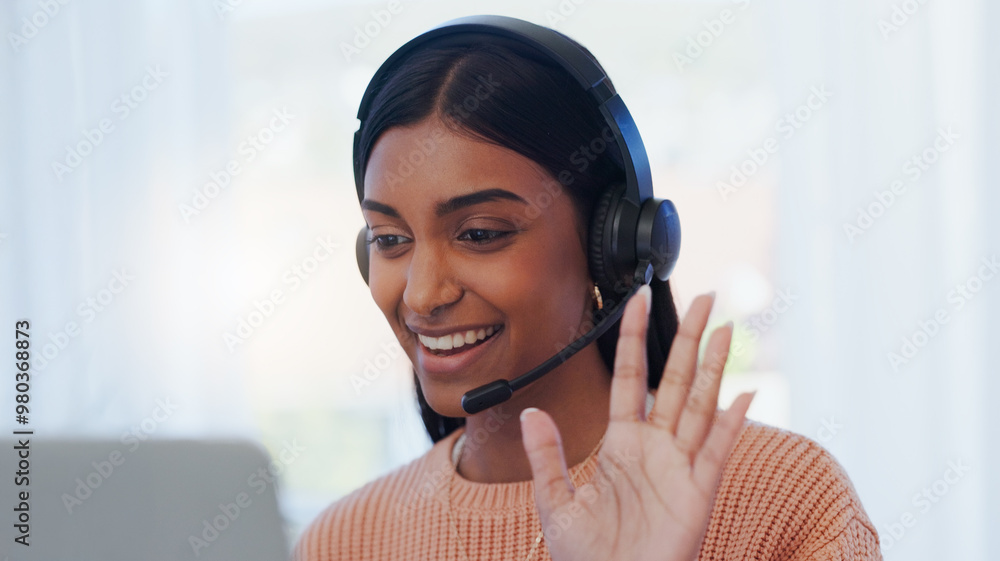 © peopleimages.com - Call center, businesswoman and wave with laptop for videocall, telemarketing or consulting for online service. Freelance, advisor and hello with microphone for listening, answer questions and helping