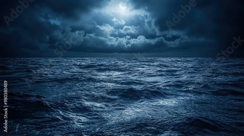 Dark Ocean Waves Wallpaper. Gentle waves of a dark ocean under a cloudy night sky.