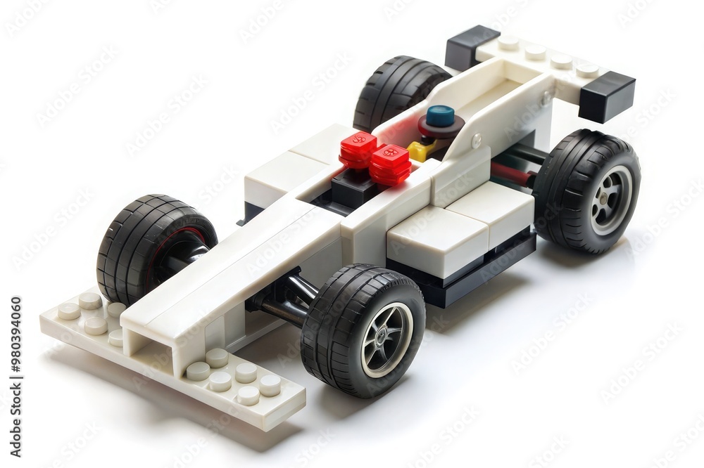 A Formula 1 racing car made with simple made of square blocks, featuring distinctive details like a rear wing and a low cockpit. The background is white A Formula 1 racing car made with simple made of square blocks, featuring distinctive details like a rear wing and a low cockpit. The background is white