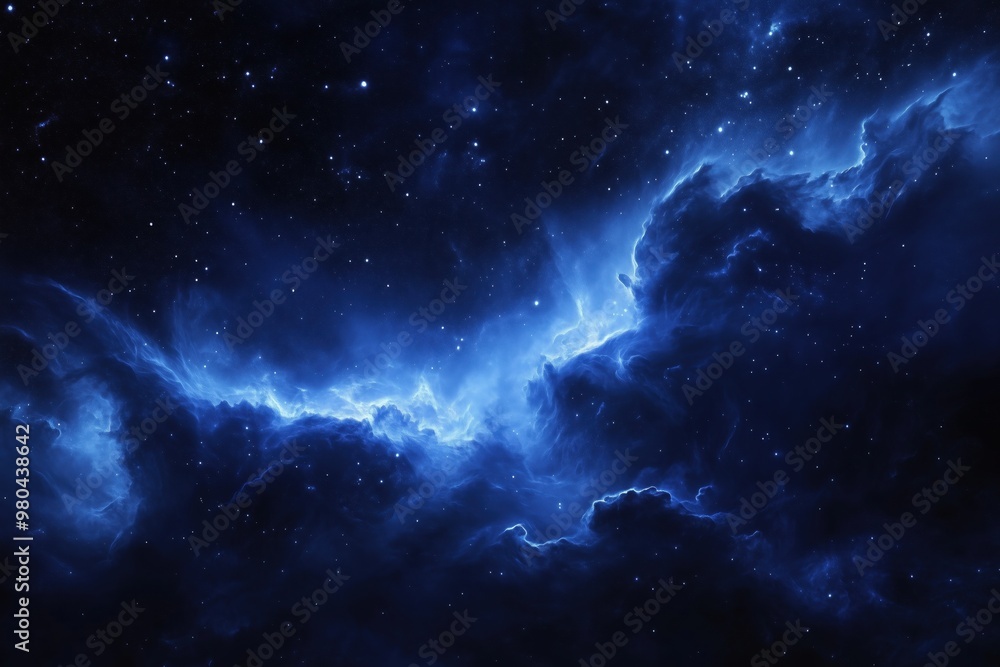 Obraz premium smoky blue clouds with a cosmic nebula illuminated against a dark sky full of stars.