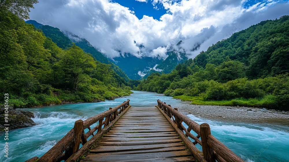 A photo of an empty wooden bridge, in front of turquoise water flowing through green mountains, surrounded by trees, with clouds above A photo of an empty wooden bridge, in front of turquoise water flowing through green mountains, surrounded by trees, with clouds above