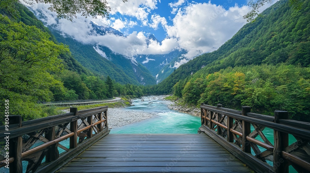 A photo of an empty wooden bridge, in front of turquoise water flowing through green mountains, surrounded by trees, with clouds above A photo of an empty wooden bridge, in front of turquoise water flowing through green mountains, surrounded by trees, with clouds above