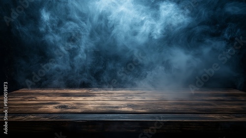 Empty wooden table with smoke on dark background.